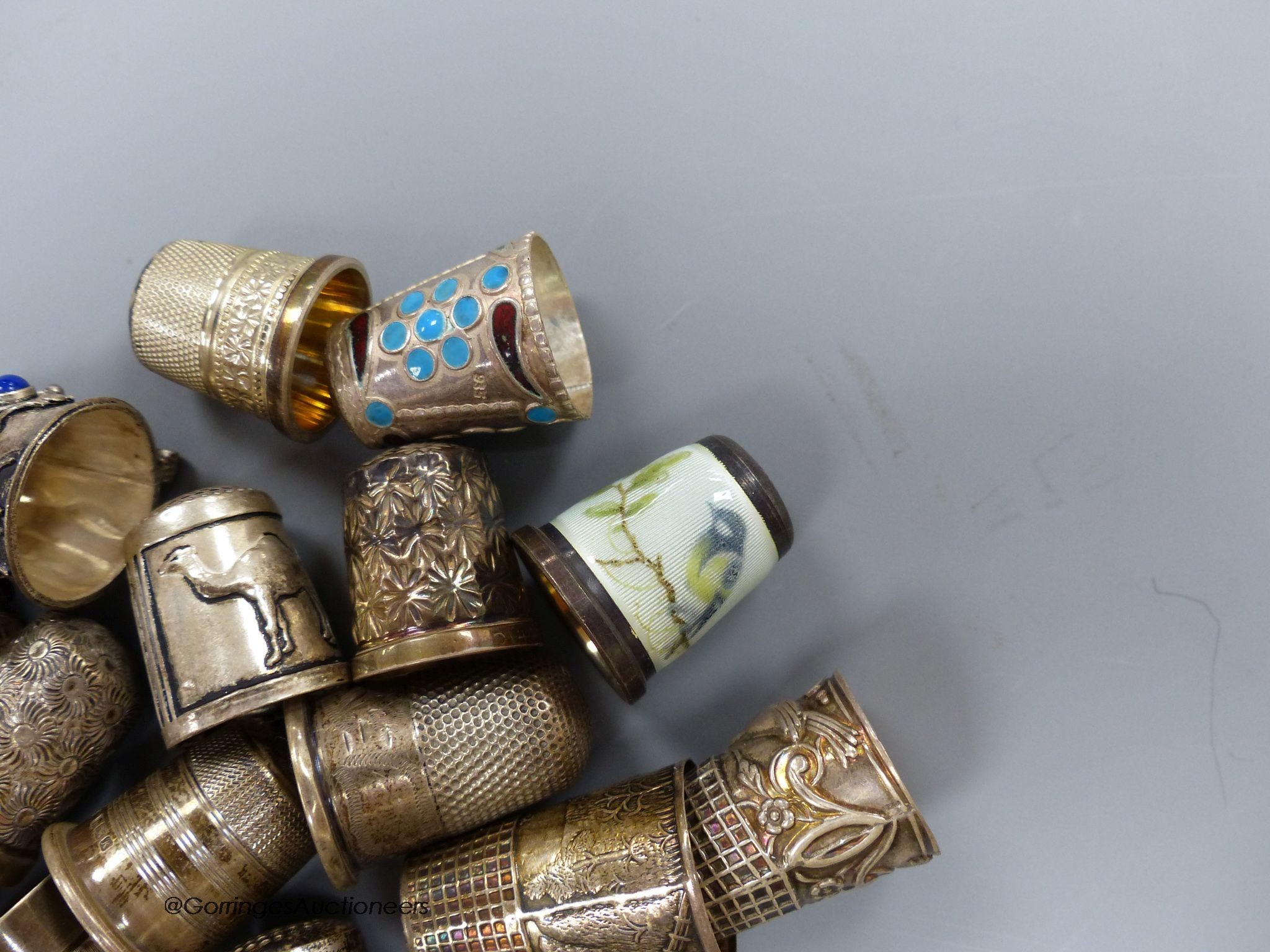 A collection of silver thimbles including a silver Charles Horner thimble